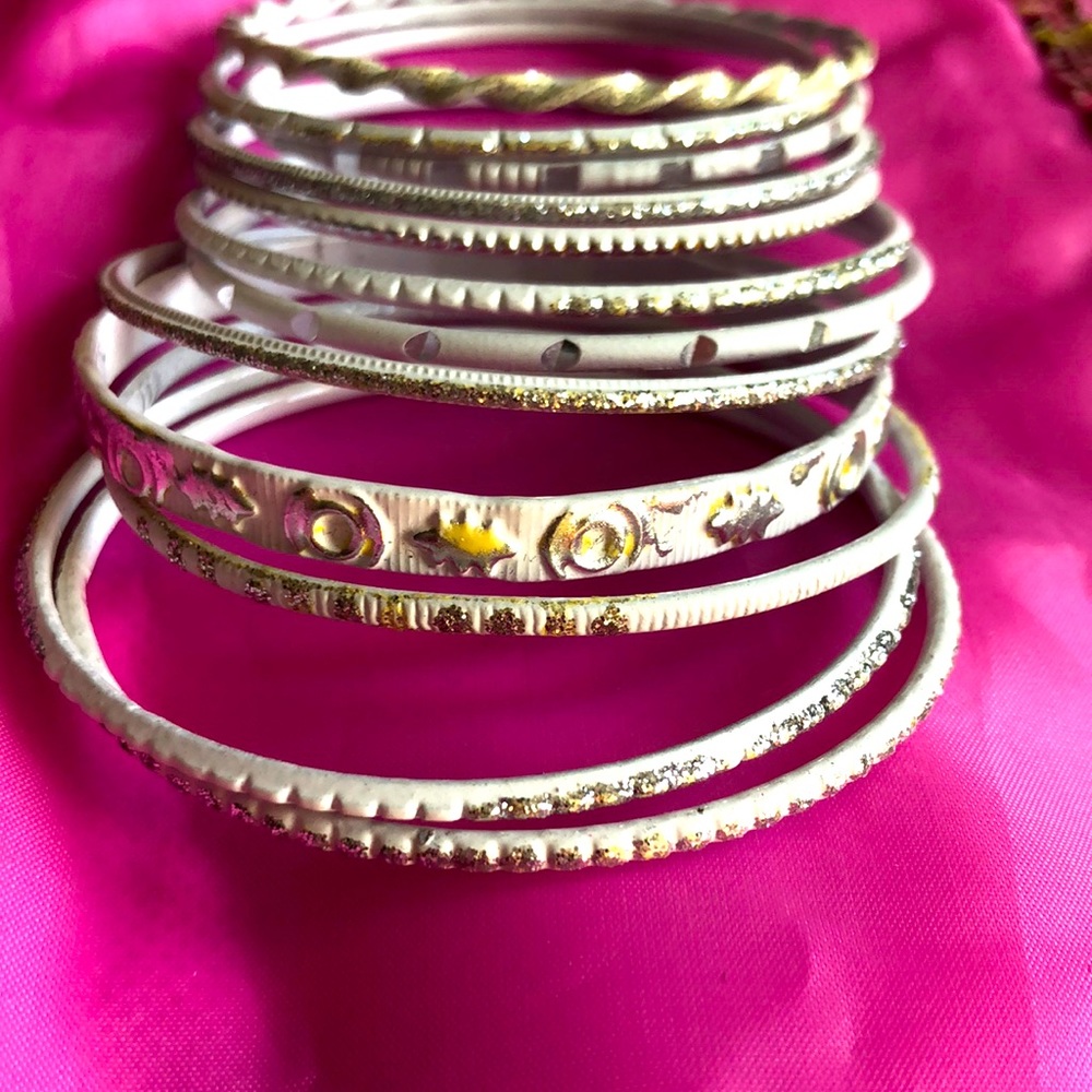 12 white and silver bracelets/ Free with a purchased item from my closet